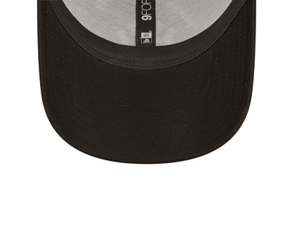 New York Yankees Home Field Black New Era 9FORTY A-Frame Trucker Cap, inside view showing the grey undervisor, black sweatband and central black taping with a white 9FORTY label and branding beneath the visor.