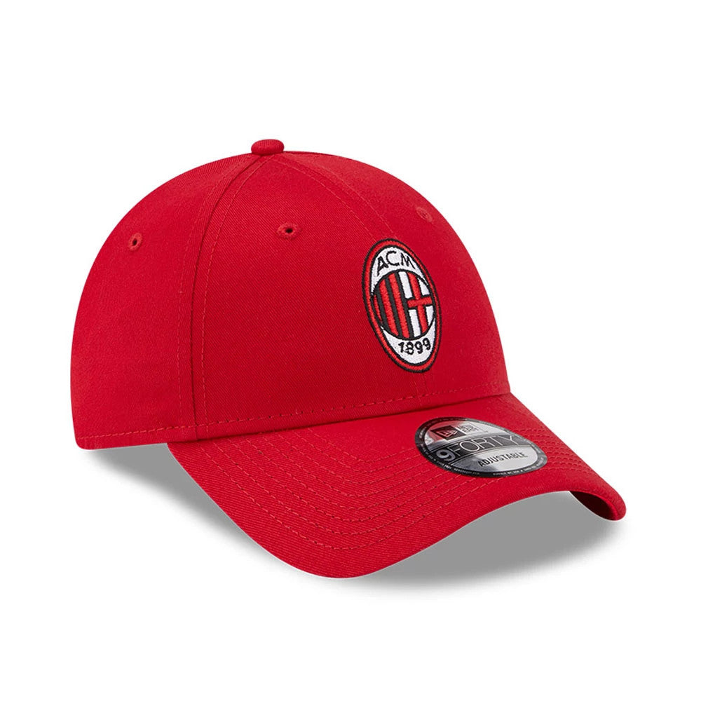 AC Milan Red New Era 9FORTY Adjustable Cap, three-quarter view showing the embroidered AC Milan crest on the front panel, with a curved red visor and the 9FORTY size sticker on top of the visor.