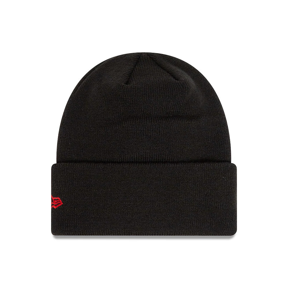 Manchester United FC Youth Black Cuff Knit Beanie Hat, front view with a black cuff, red New Era flag logo embroidered on the left side, and a smooth black dome top with minimal seaming.