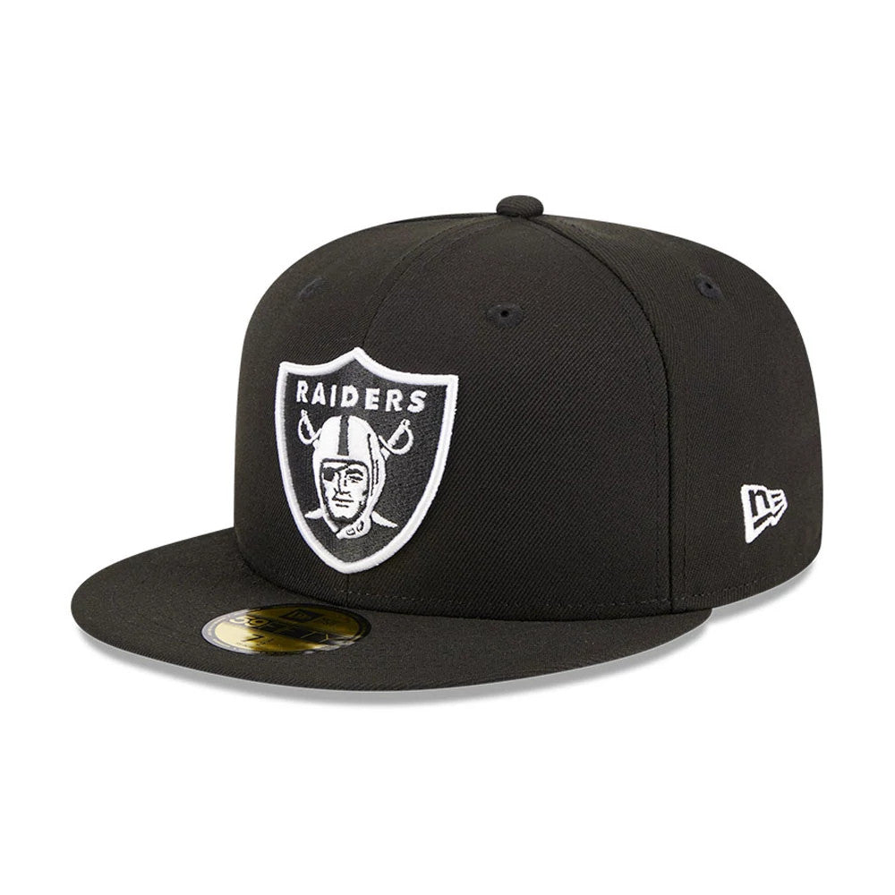 Las Vegas Raiders NFL Evergreen Black New Era 59FIFTY Fitted Cap, three-quarter view with a white embroidered Raiders shield logo on the front panel, a black visor with the gold 59FIFTY size sticker, and the New Era flag logo on the left side.