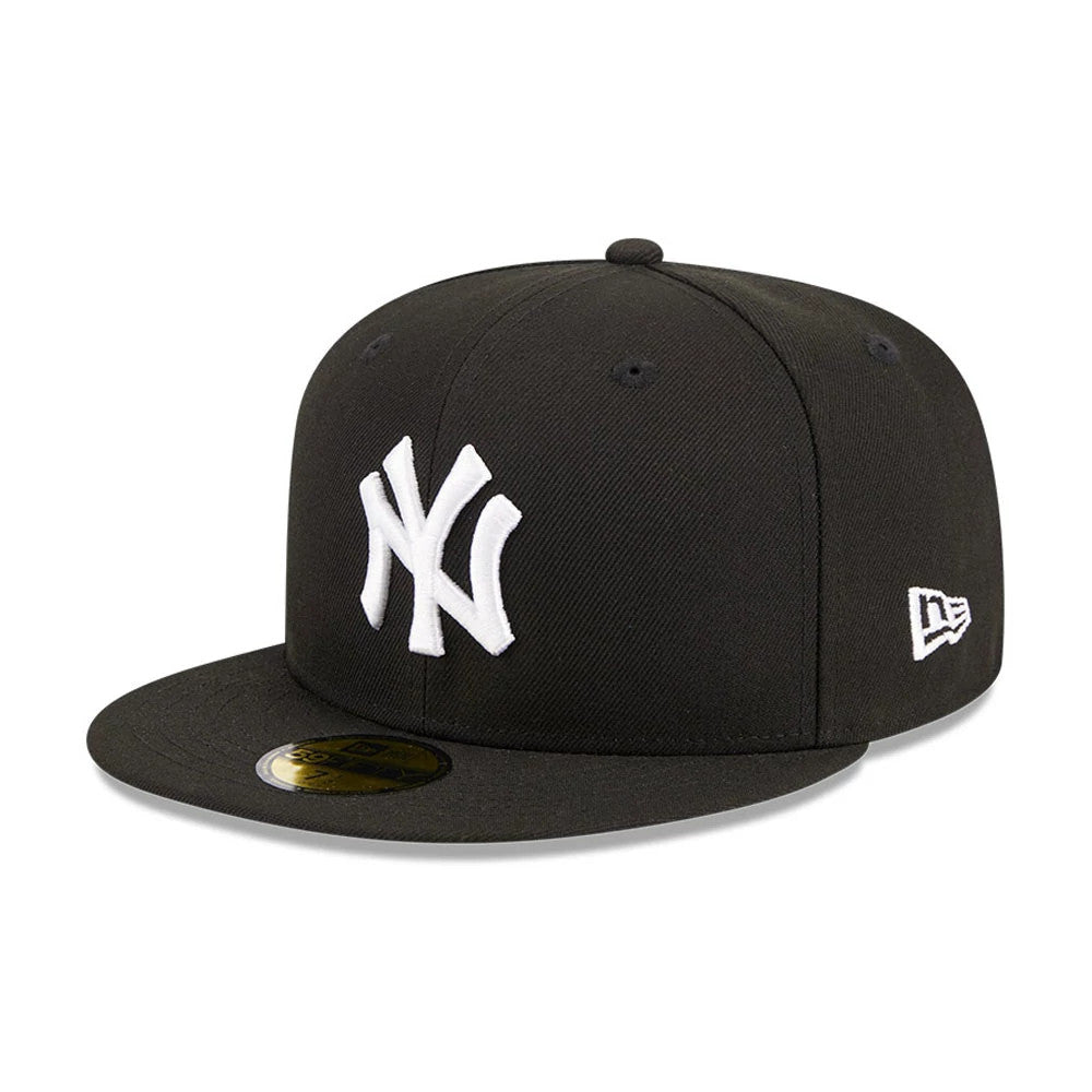New York Yankees MLB Evergreen Black New Era 59FIFTY Fitted Cap, three-quarter view with the raised white NY logo on the front panel, the New Era flag logo embroidered in white on the left side, and gold 59FIFTY size sticker on the visor.