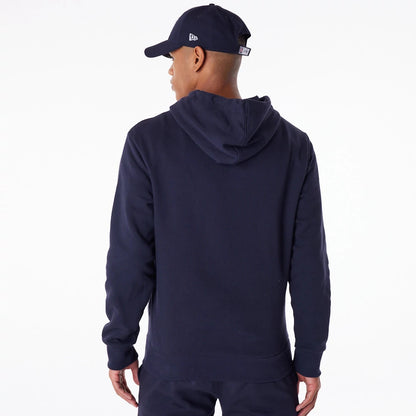 New York Yankees MLB Essential Navy Full Zip Hoodie, rear view showing the plain navy back with a spacious hood, worn by a figure in a navy cap with a debossed New Era logo on the side.