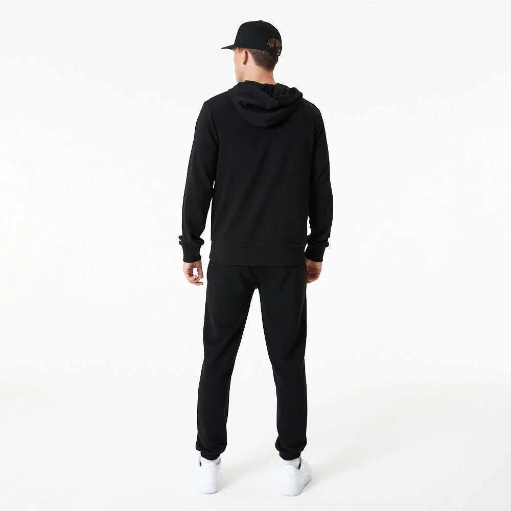 The Male model is wearing New Era Essential Black Pullover Hoodie 7