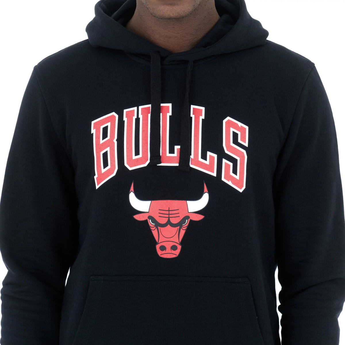 Chicago Bulls NBA Regular Black Pullover Hoodie, front view showing the bold red Chicago Bulls lettering and logo printed on the chest with an attached hood and black drawstrings, covering a black background.