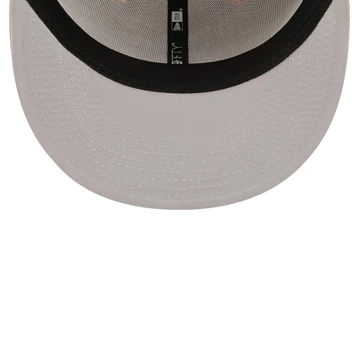 New York Yankees League Essential Stone New Era 59FIFTY Fitted Cap, inside view showing the grey undervisor with black taping featuring the 59FIFTY branding in white, set against a structured design.