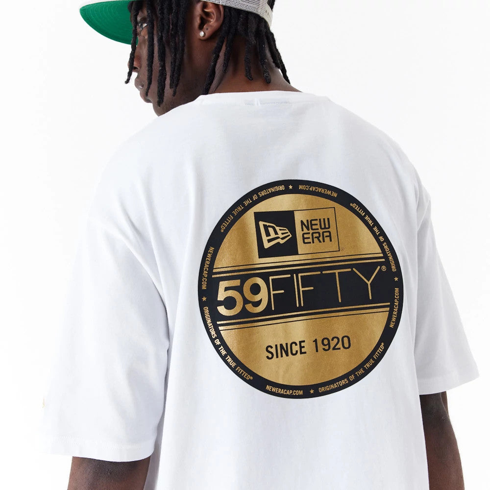 New Era Sticker White Oversized T-Shirt, rear view showing a large circular gold and black graphic with the 59FIFTY logo and New Era branding centred on the back of the white fabric.