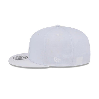 LA Dodgers MLB Evergreen White New Era 9FIFTY Snapback Adjustable Cap, side view showing a white embroidered New Era flag logo on the left side, a structured white crown and a flat visor with a 9FIFTY size sticker.