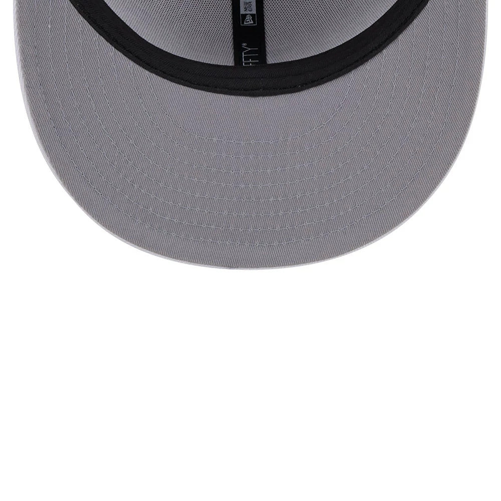 LA Dodgers MLB Evergreen White New Era 9FIFTY Snapback Adjustable Cap, inside view showing the grey undervisor with black sweatband and taping, featuring the New Era logo and 9FIFTY branding.