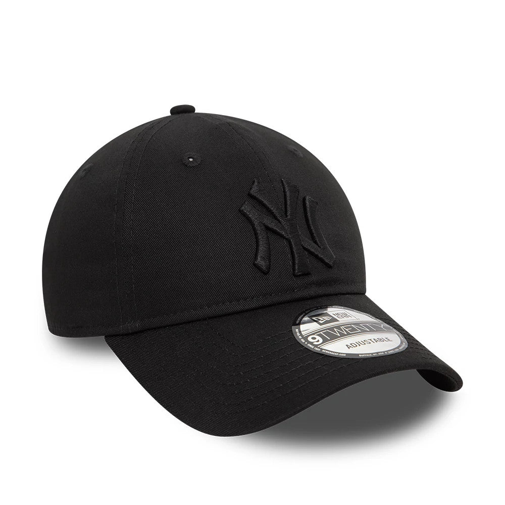 New York Yankees League Essential Black On Black New Era 9TWENTY Adjustable Cap, front view showing raised black NY logo embroidery on the front panel, with a curved visor and a 9TWENTY size sticker on top.