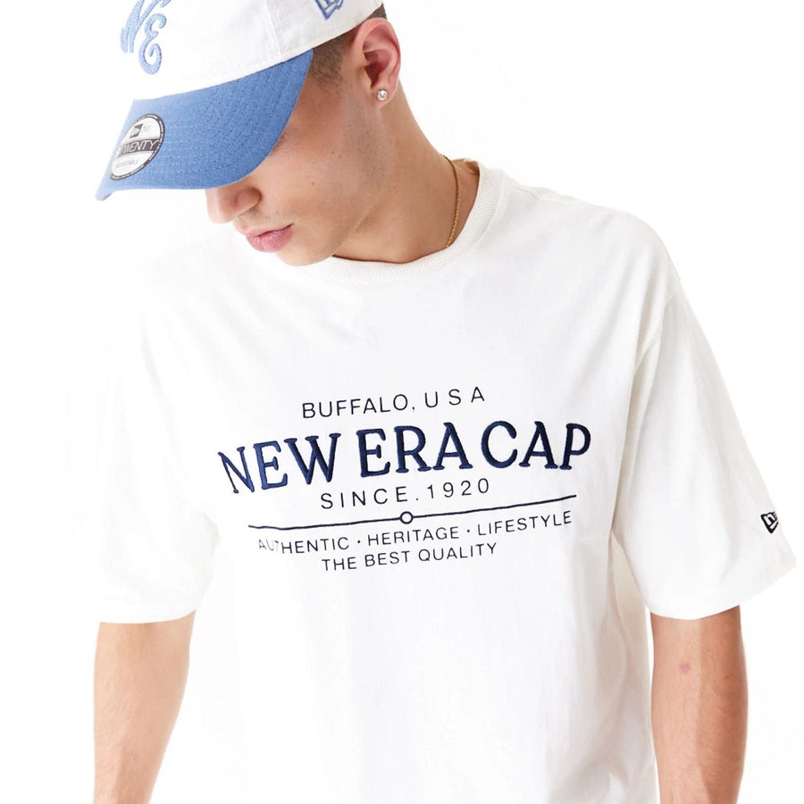 The Male model is wearing New Era Graphic White Oversized T-Shirt 3