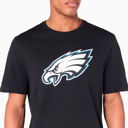New Era Philadelphia Eagles NFL Black T-Shirt, front view showing the large graphic eagle logo printed in white and teal on the chest, set against a plain black fabric with a crew neck.