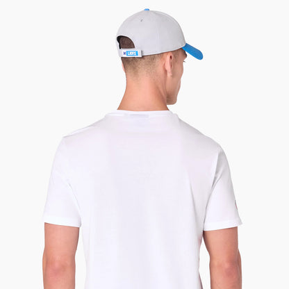 New Era Detroit Lions NFL White T-Shirt, rear view showing a plain white back with a grey cap featuring a blue brim and debossed logo on the rear tab, eyelets on the cap, worn by a model.