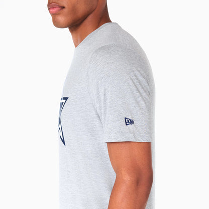 New Era Dallas Cowboys NFL Grey T-Shirt, side view showing a grey short sleeve with a raised New Era logo near the cuff, part of the Dallas Cowboys logo visible on the chest and a close fit on the model's arm.
