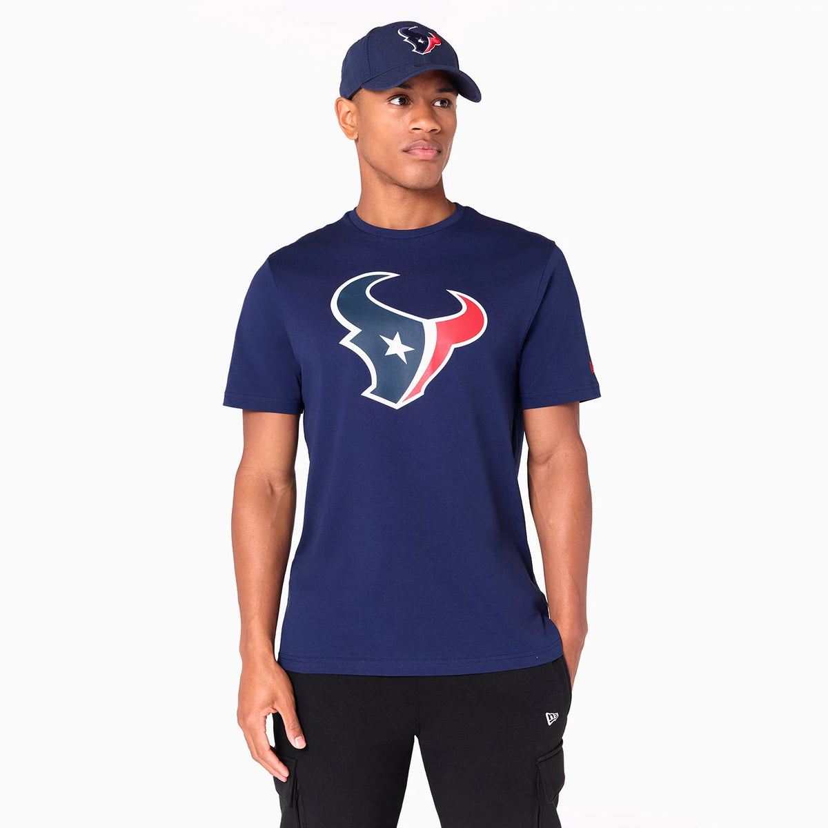 New Era Houston Texans NFL Navy T-Shirt, on-model view showing a large team logo in white, navy, and red centred on the chest, with the model wearing a matching navy cap featuring a raised team logo on the front.