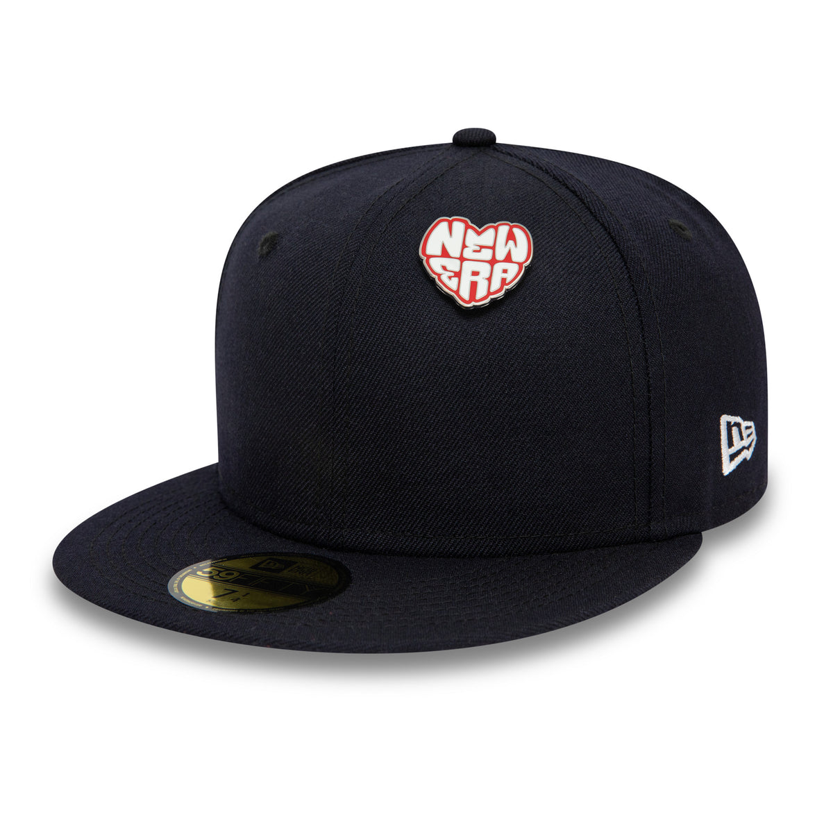 New Era Heart Silver Pin Badge, front view showing a black cap with a heart-shaped pin featuring the New Era logo in white at the centre, an embroidered New Era logo on the side and a circular sticker on the brim.