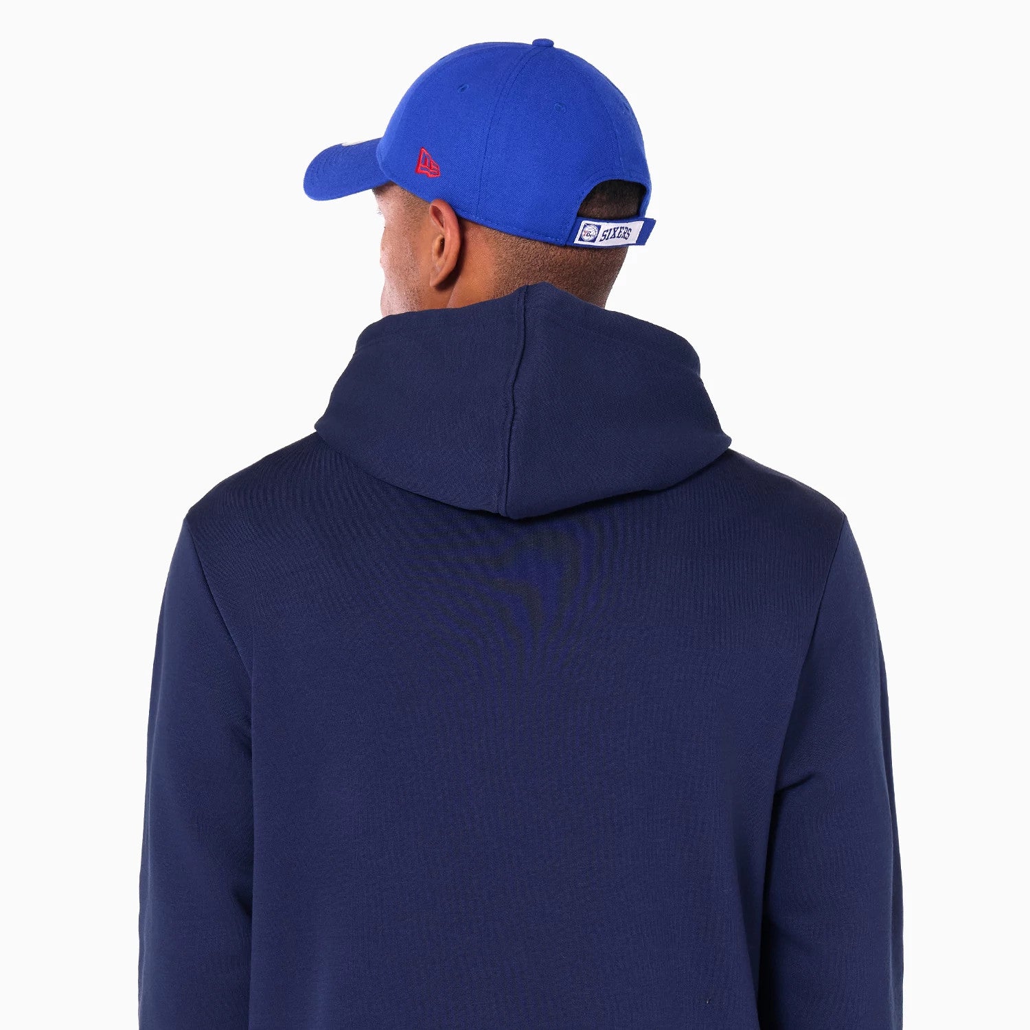 The Male model is wearing Philadelphia 76ers NBA Navy Pullover Hoodie 3