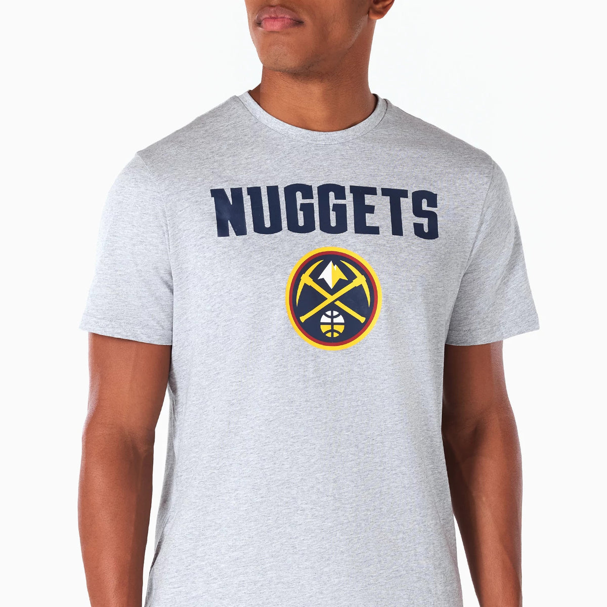 New Era Denver Nuggets NBA Grey T-Shirt, front view showing a large navy NUGGETS text across the chest and the team's logo printed below, featuring a pickaxe and mountain design in yellow and navy on a light grey background.