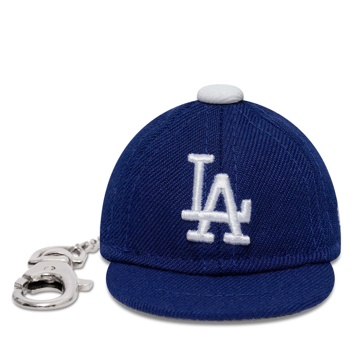 New Era LA Dodgers MLB Mini Cap Dark Blue Key Chain, front view showing the white LA logo embroidered on the structured dark blue crown, with a small flat visor and a silver keychain attachment on the left side.