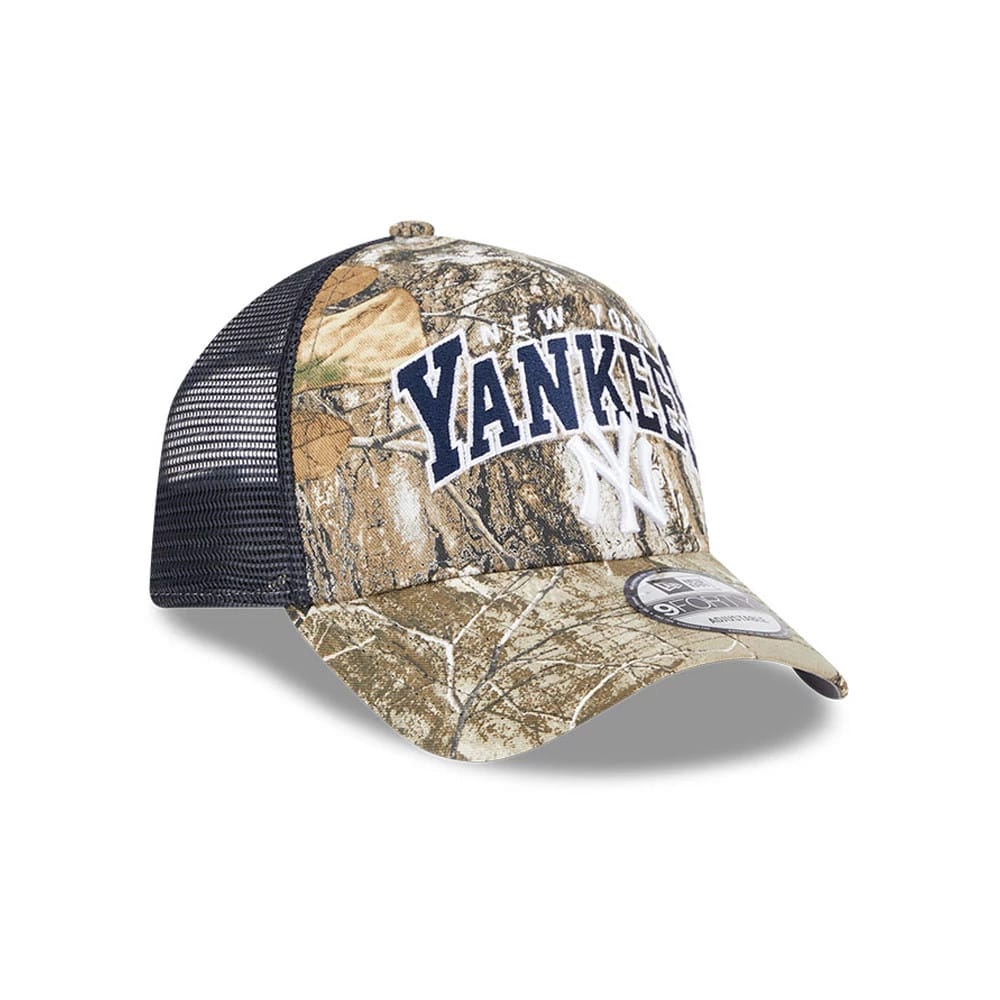 Pictured is this MLB Realtree Camo New York Yankees 9FORTY A-Frame Trucker Adjustable cap in navy. 4