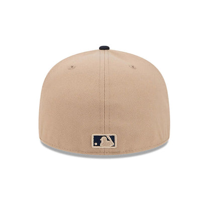 Pictured is this MLB Evergreen New York Yankees 59FIFTY Fitted cap in light beige. 7