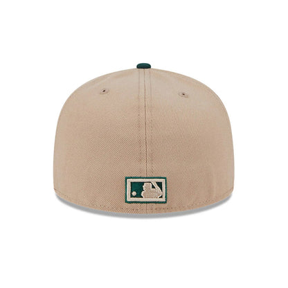Pictured is this MLB Evergreen Athletics 59FIFTY Fitted cap in light beige. 7