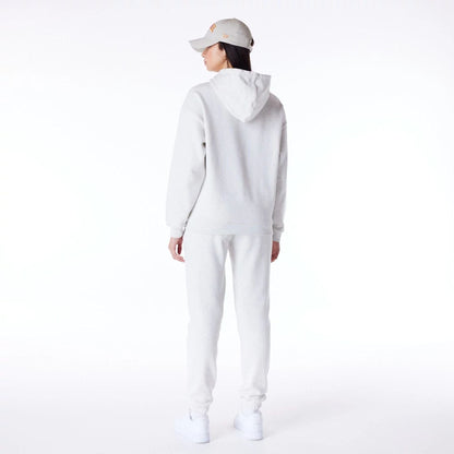 The Female model is wearing New Era Infill Grey Oversized Pullover Hoodie 8