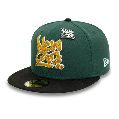 This is a New Era Front Script 59FIFTY Fitted Cap in dark green & black. 1