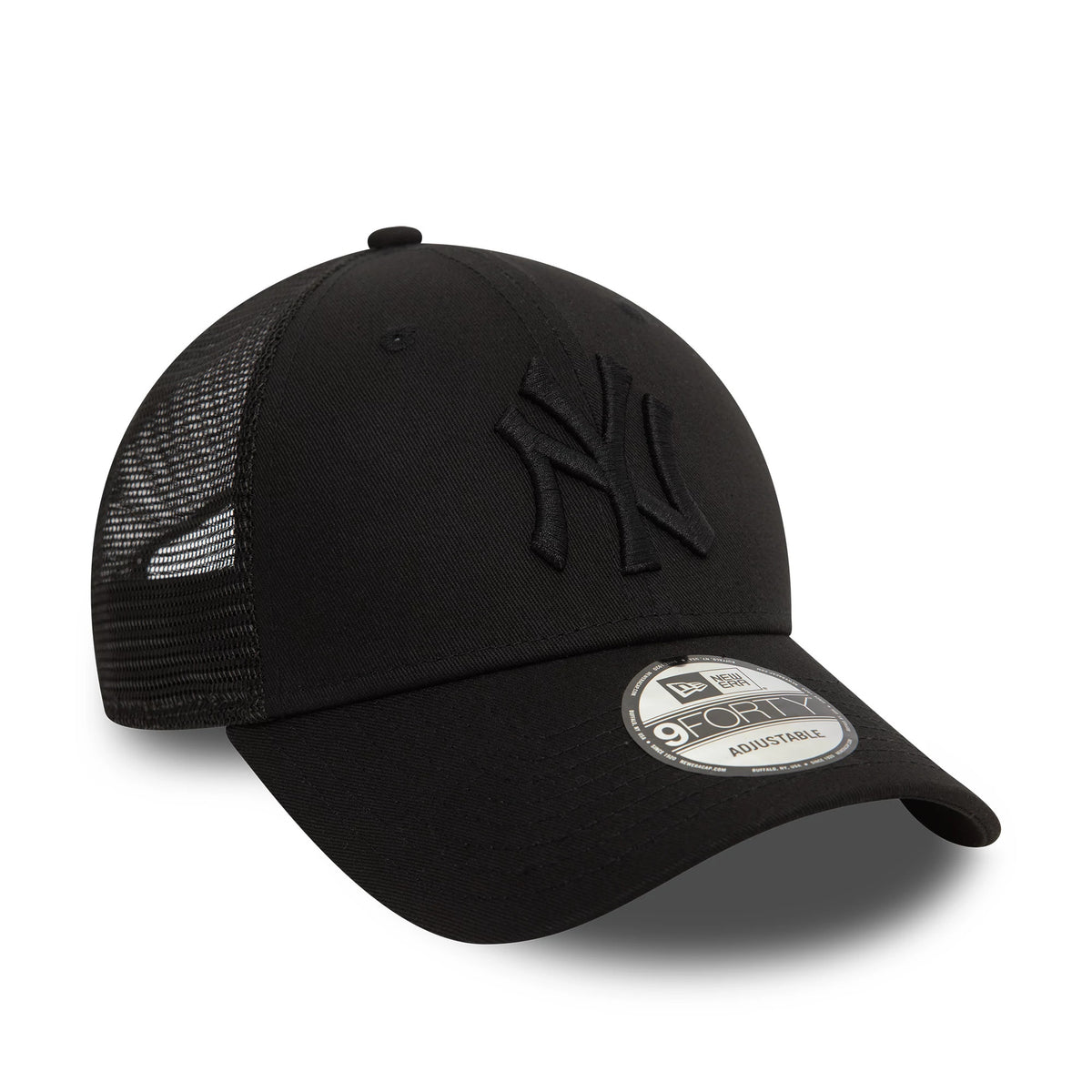 New York Yankees Home Field Black New Era 9FORTY Trucker Adjustable Cap, three-quarter view with raised black NY logo on the front panel, black mesh side panels, and 9FORTY size sticker on the curved black visor.