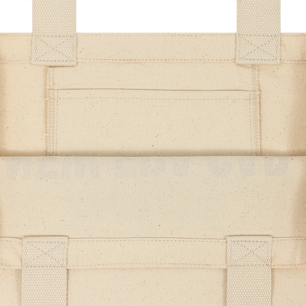 New Era Cap Carnaby Address Light Beige Canvas Tote Bag, front view highlighting the light beige canvas with reinforced stitching on the handles and a discreet debossed New Era logo centred at the top.