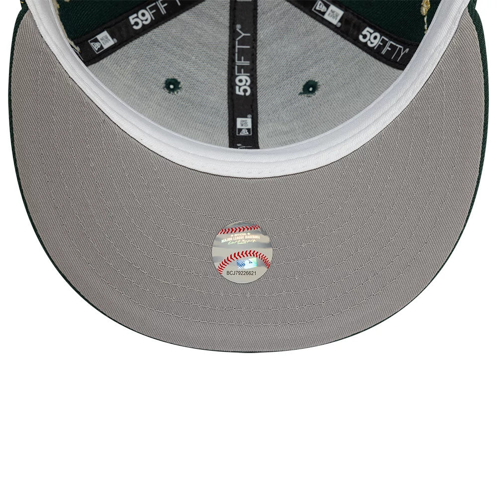 Athletics MLB Zodiac Dark Green New Era 59FIFTY Fitted Cap, inside view showing grey undervisor, black 59FIFTY taping, white sweatband, and a sticker with baseball stitching near the visor's centre.