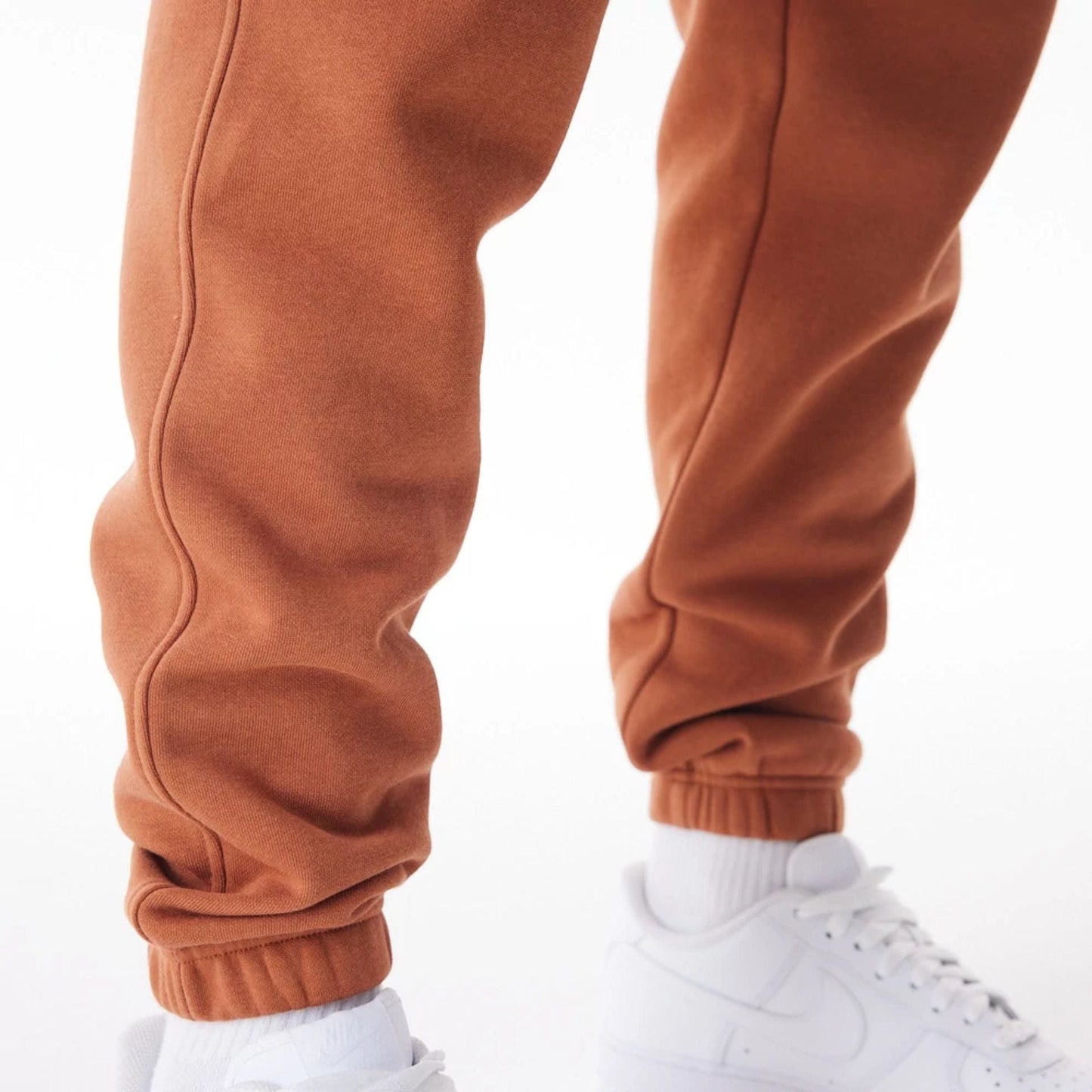 The Male model is wearing LA Dodgers MLB Gradient Graphic Brown Joggers  10