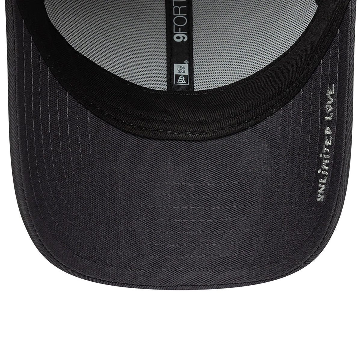 New Era x Zadig&Voltaire Amour Dark Grey New Era 9FORTY Adjustable Cap, inside view showing the grey taping with a 9FORTY size sticker, black sweatband and silver text embroidery on the dark grey undervisor.