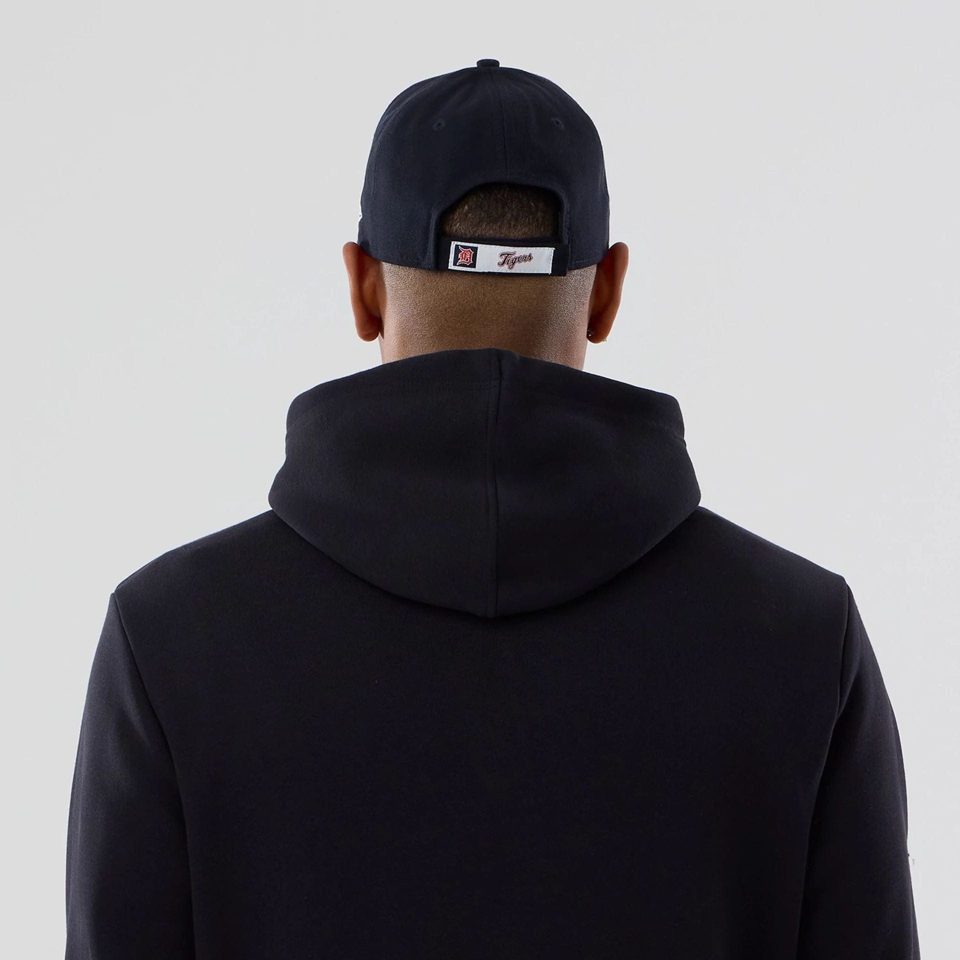 The Male model is wearing Detroit Tigers MLB Navy Pullover Hoodie 7