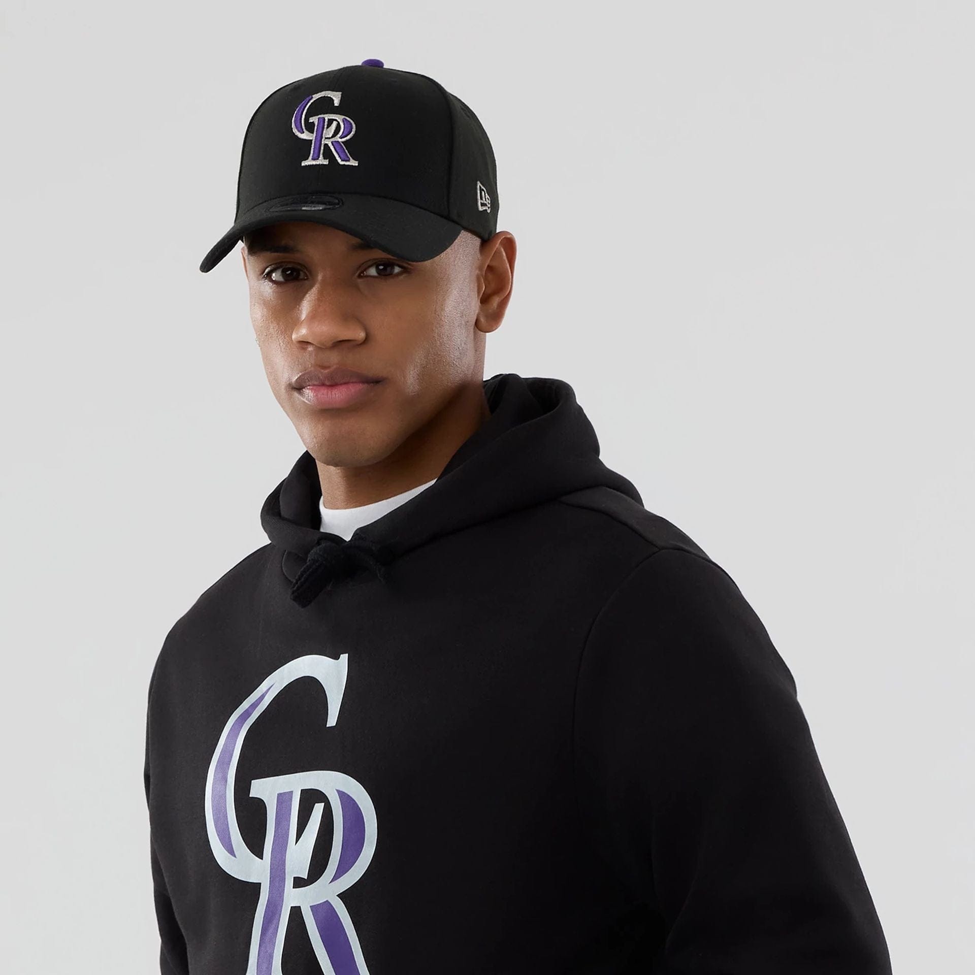 The Male model is wearing Colorado Rockies MLB Black Pullover Hoodie 6