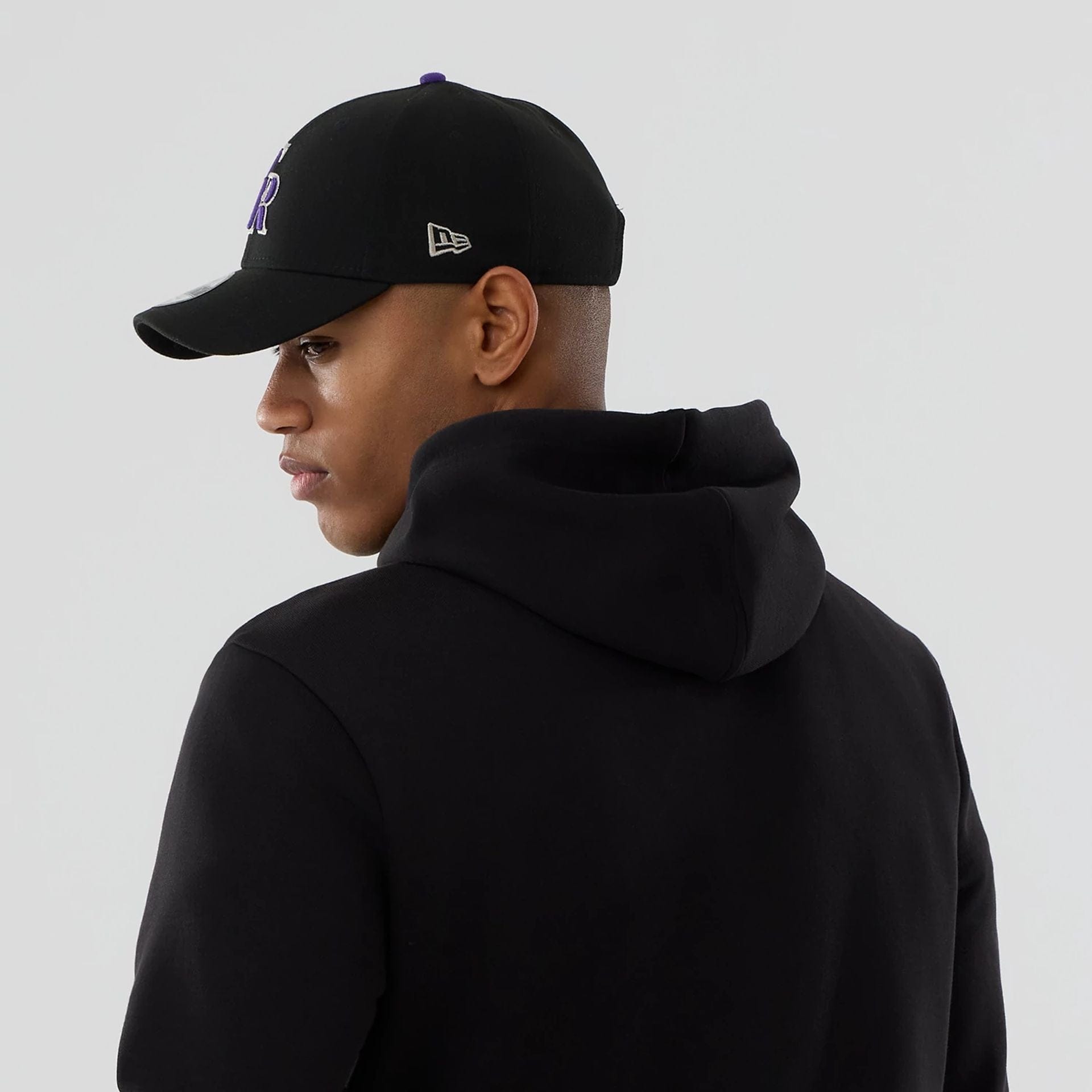 The Male model is wearing Colorado Rockies MLB Black Pullover Hoodie 7
