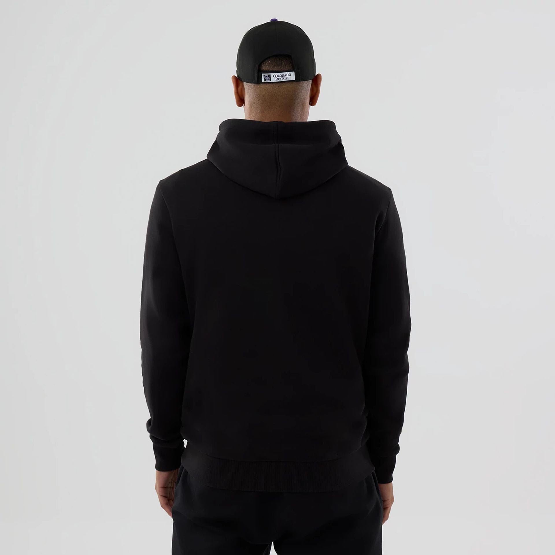 The Male model is wearing Colorado Rockies MLB Black Pullover Hoodie 2