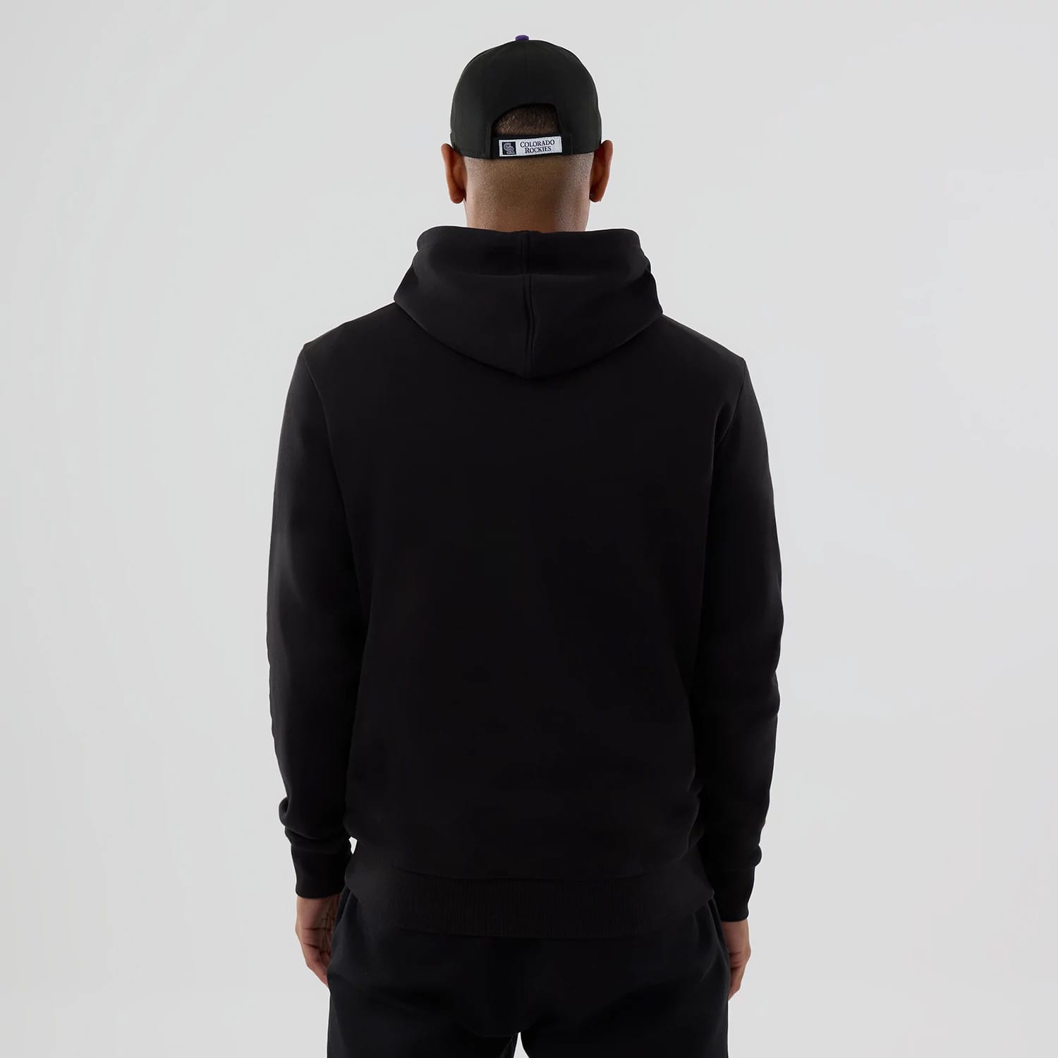 The Male model is wearing Colorado Rockies MLB Black Pullover Hoodie 2