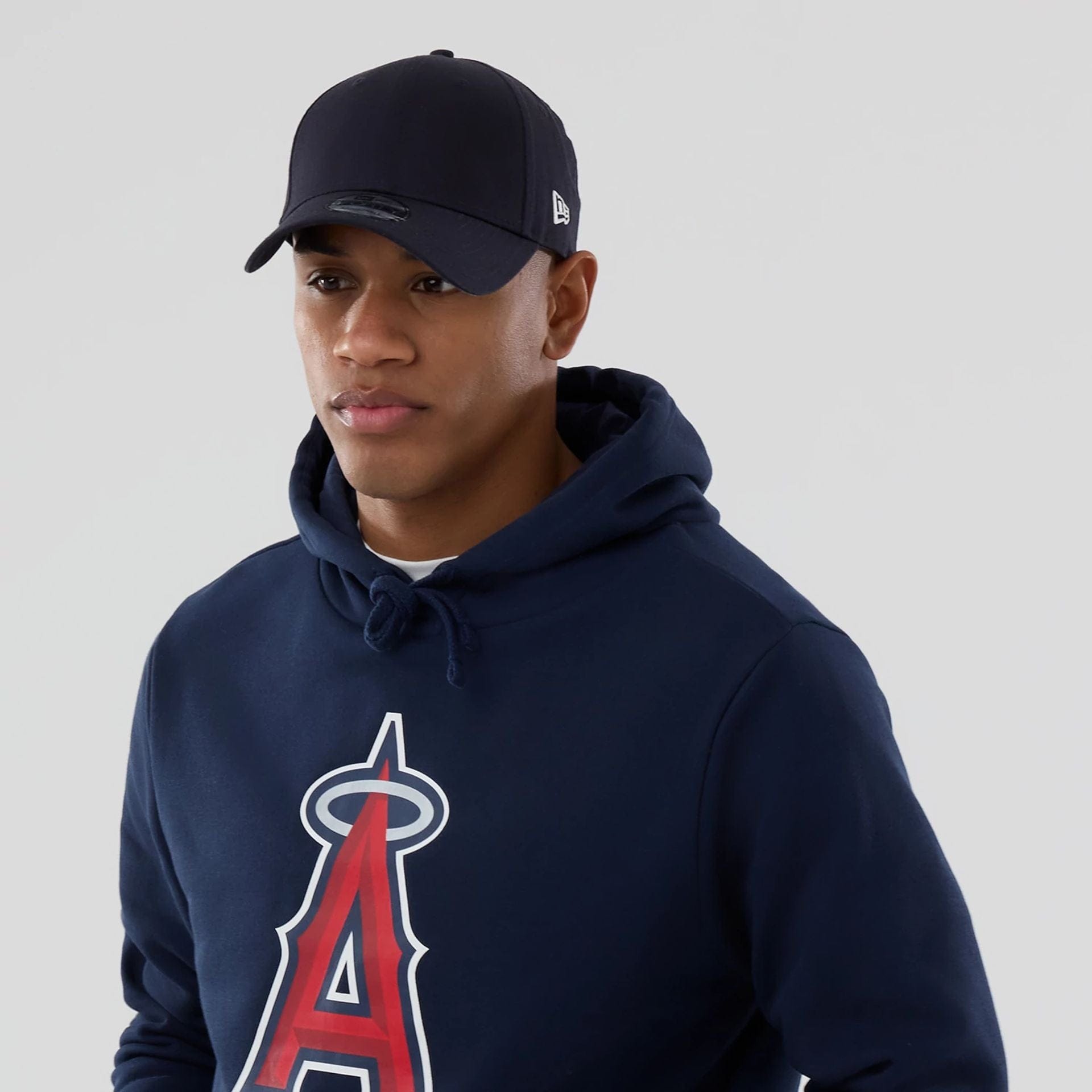 The Male model is wearing LA Angels MLB Dark Blue Pullover Hoodie 6