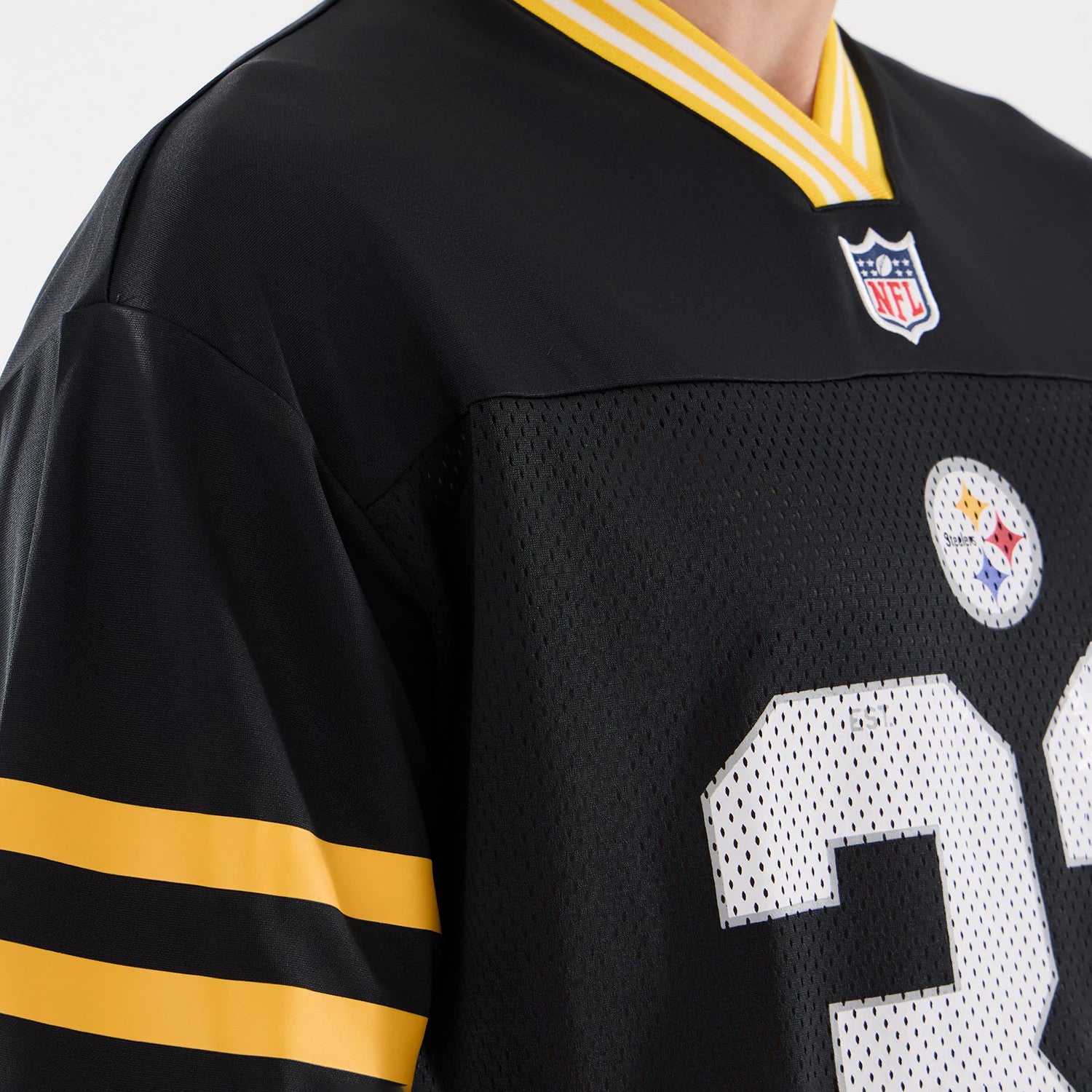 The Male model is wearing Pittsburgh Steelers NFL Mesh Black Mesh Jersey 3