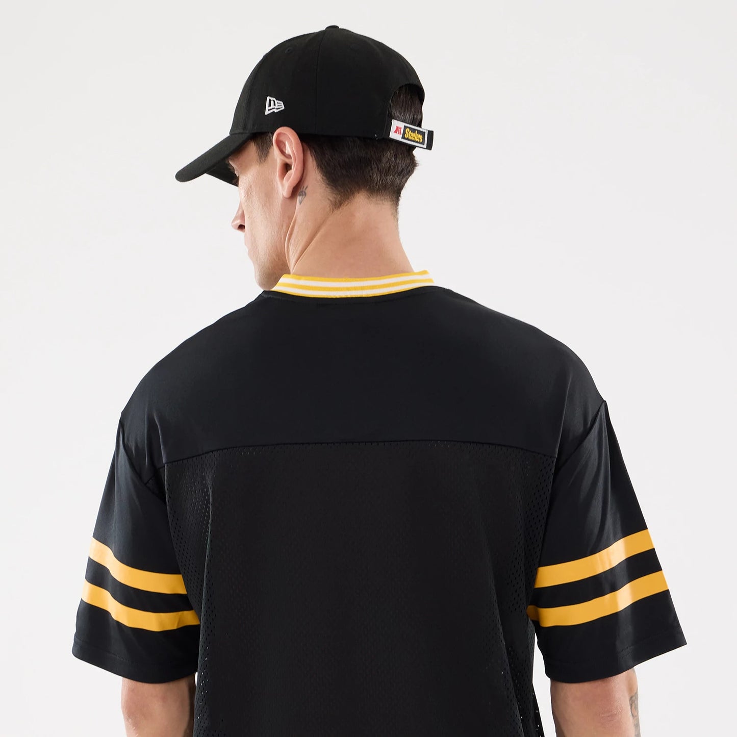 The Male model is wearing Pittsburgh Steelers NFL Mesh Black Mesh Jersey 7