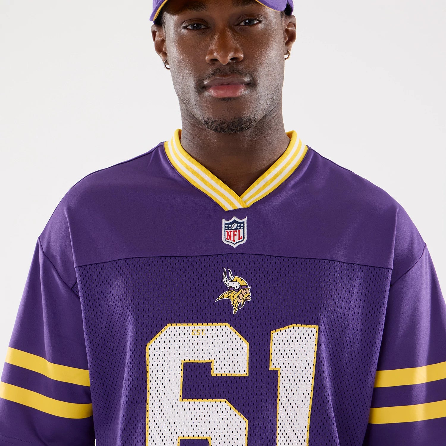 The Male model is wearing Minnesota Vikings NFL Mesh Purple Mesh Jersey 5
