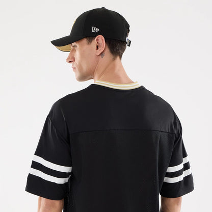 The Male model is wearing New Orleans Saints NFL Mesh Black Mesh Jersey 7