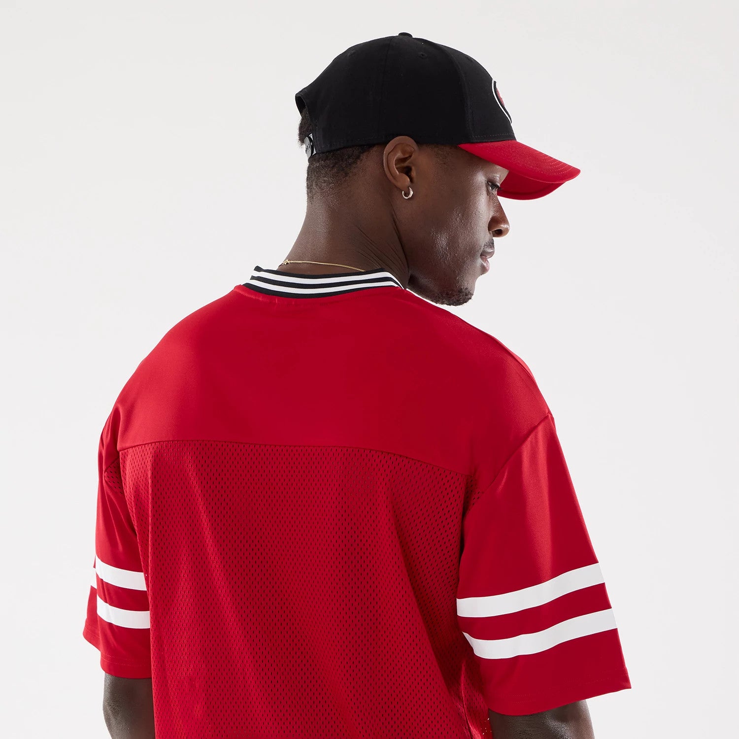 The Male model is wearing San Francisco 49ers NFL Mesh Red Mesh Jersey 7