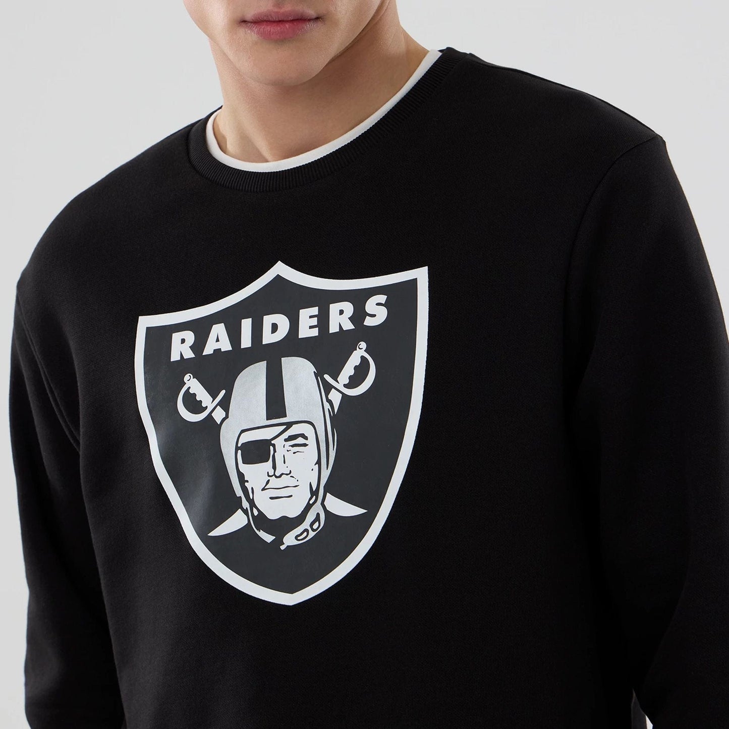 The Male model is wearing Las Vegas Raiders NFL Black Crew Neck Sweater 3