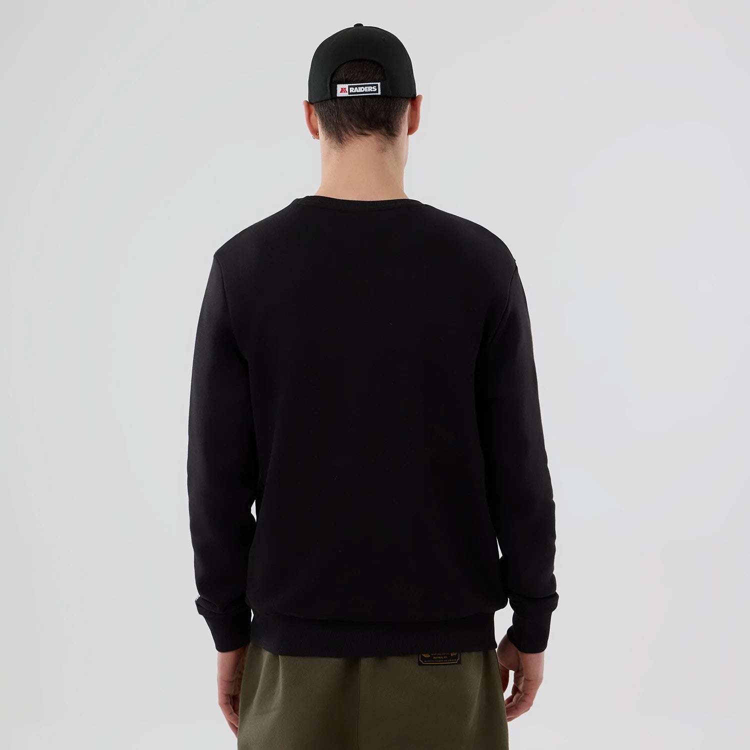 The Male model is wearing Las Vegas Raiders NFL Core Black Crew Neck Sweater 2