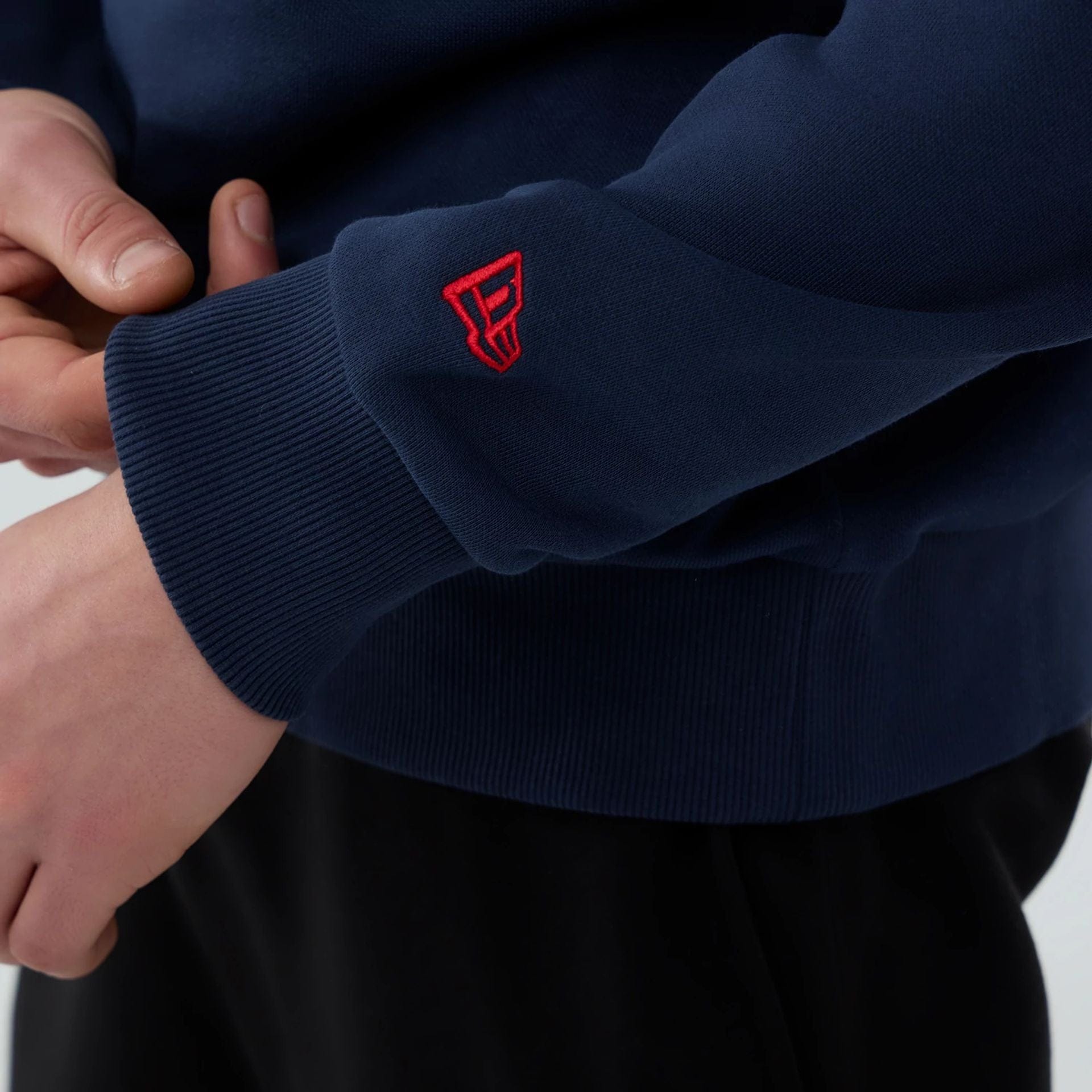 The Male model is wearing New England Patriots NFL Dark Blue Crew Neck Sweater 5