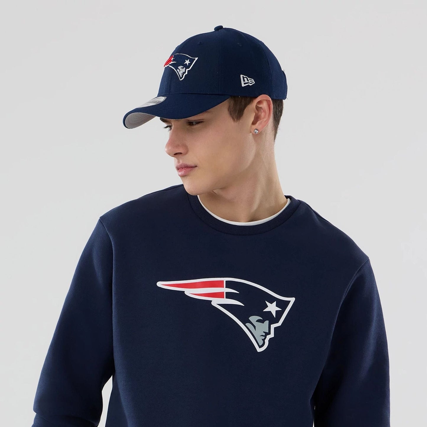 The Male model is wearing New England Patriots NFL Dark Blue Crew Neck Sweater 6
