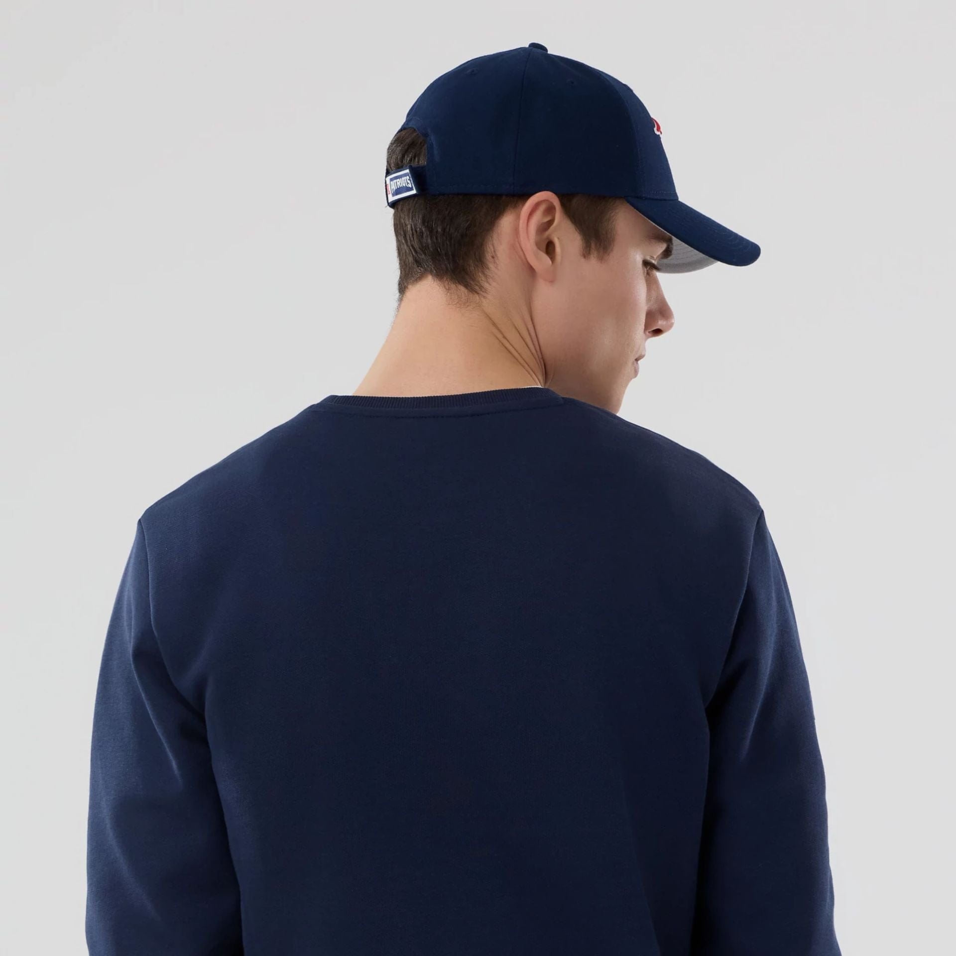 The Male model is wearing New England Patriots NFL Dark Blue Crew Neck Sweater 7