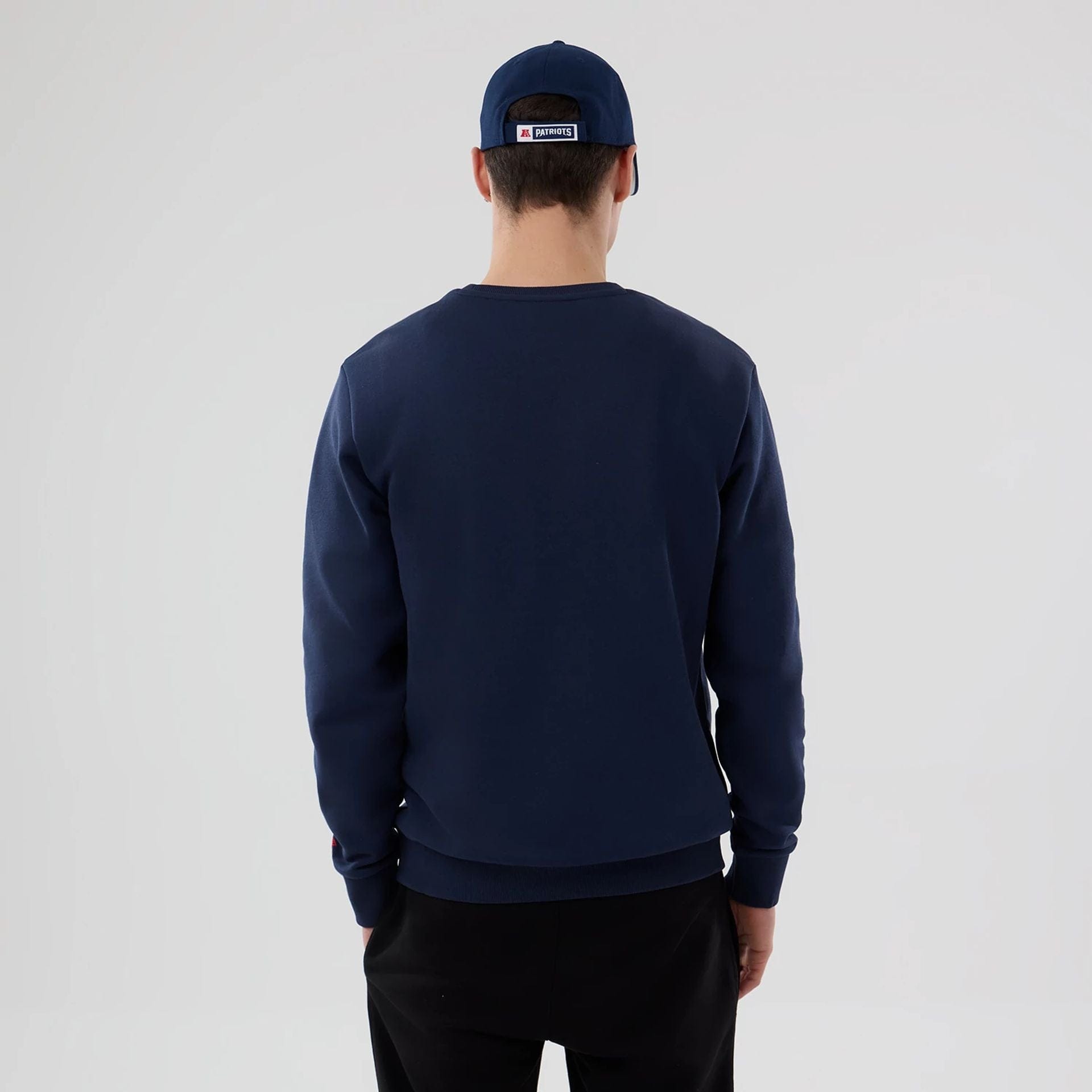 The Male model is wearing New England Patriots NFL Dark Blue Crew Neck Sweater 2
