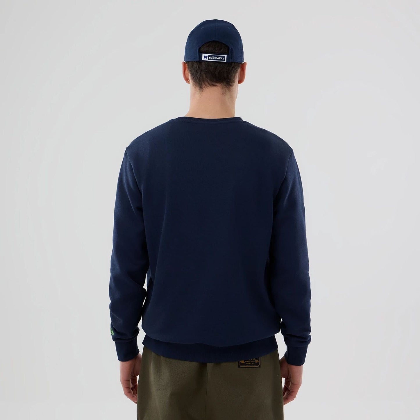 The Male model is wearing Seattle Seahawks NFL Dark Blue Crew Neck Sweater 2